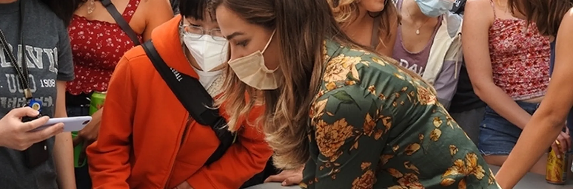 Britanny Kohler, then a member of the UC Davis Entomology Club, works the roach race track in this 2022 image. She is a UC Davis alumna and a research associate at the Bohart Museum of Entomology. (Photo by Kathy Keatley Garvey)