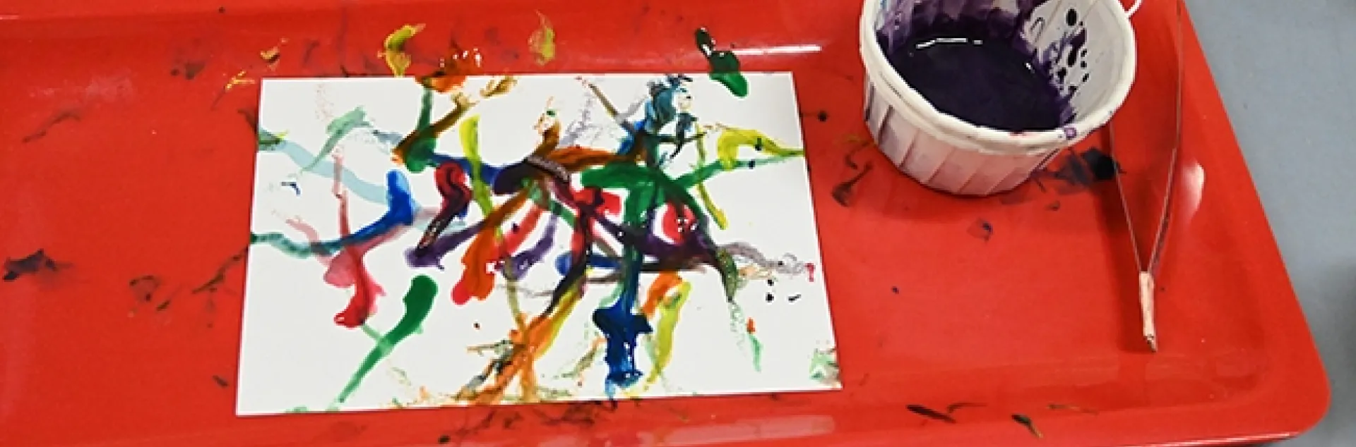 Maggot Art at the Bohart Museum of Entomology open house. Tools of the trade: maggots, water-based and non-toxic paint, paint containers, forceps, and white paper. (Photo by Kathy Keatley Garvey)