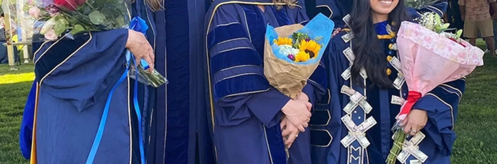 Entomology PhDs wore insect antennae on their mortarboards. In front (from left) are six new PhDs: Lindsay Mack and Erin "Taylor" Kelly of the Geoffrey Attardo lab; and Christine Tabuloc of the Joanna Chiu lab. In back are Xavier Zahnle of the Jason Bond lab; and Zachary Griebenow and Jill Oberski of the Phil Ward lab.