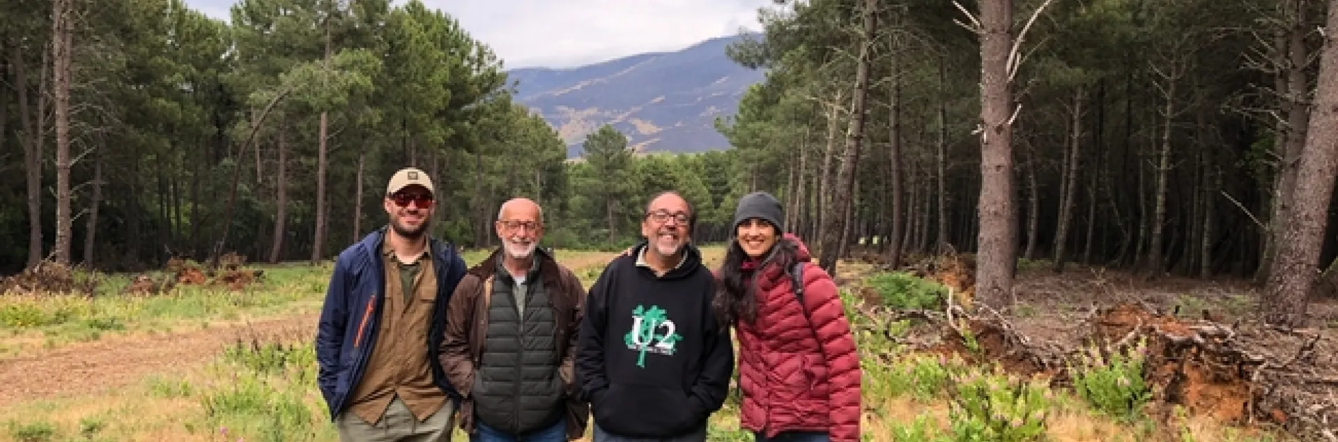Visiting a fuel break. Adjacent pines have been thinned for resin collection. Members of the Mosaic Project Team and me. From Left to Right: Álvaro Gómez, Óscar Conejero, Fernando Pulido, and Devii Rao. Photo by Daniel George.