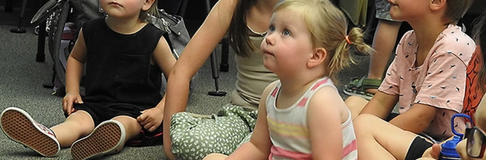 The Bohart Museum of Entomology
insect presentation fascinates these youngsters at the Vacaville Public Library. (Photo by Kathy Keatley Garvey)