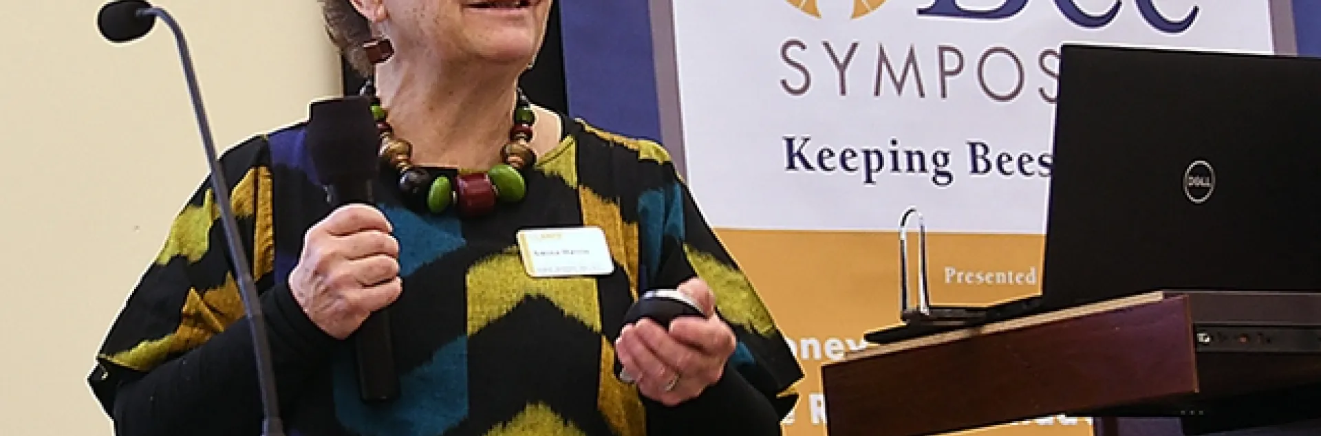 Amina Harris, as director of the UC Davis Honey and Pollination Center, speaking at the 2018 UC Davis Bee Symposium that she organized. (Photo by Kathy Keatley Garvey)