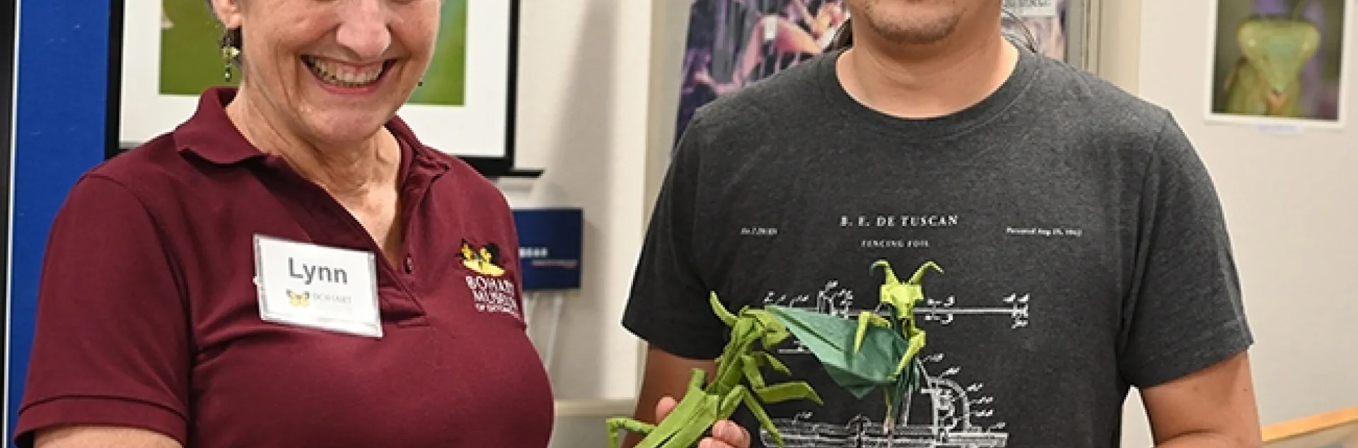 UC Davis alumnus Kevin Murakoshi of Davis gifted the Bohart Museum of Entomology with origami praying mantises. With him is UC Davis distinguished professor Lynn Kimsey, director of the Bohart Museum. (Photo by Kathy Keatley Garvey)