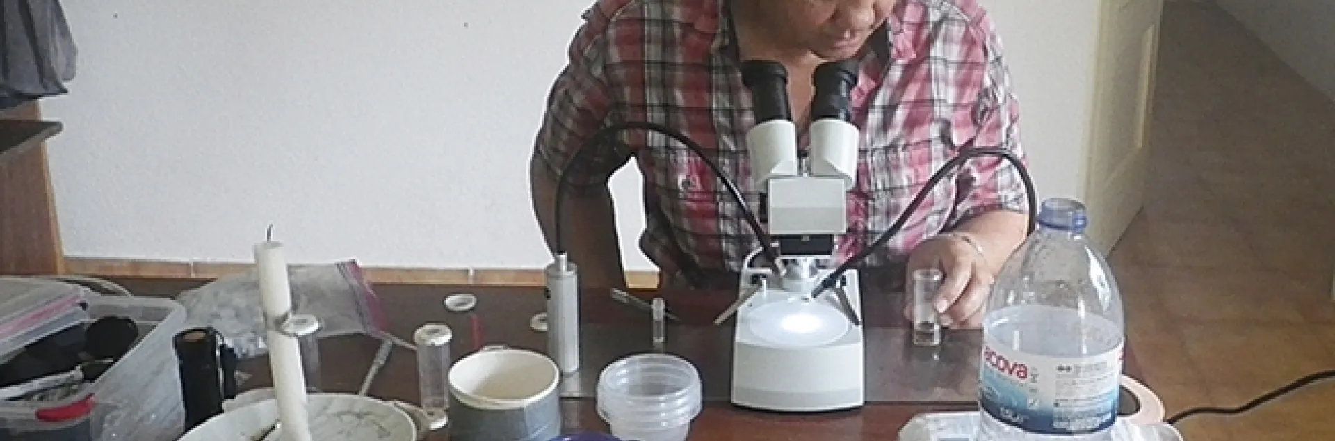 Anthony "Anton" Cornel of the UC Davis Department of Entomology and Nematology faculty identifying and preserving mosquitoes at the Botanical Gardens in São Tomé.