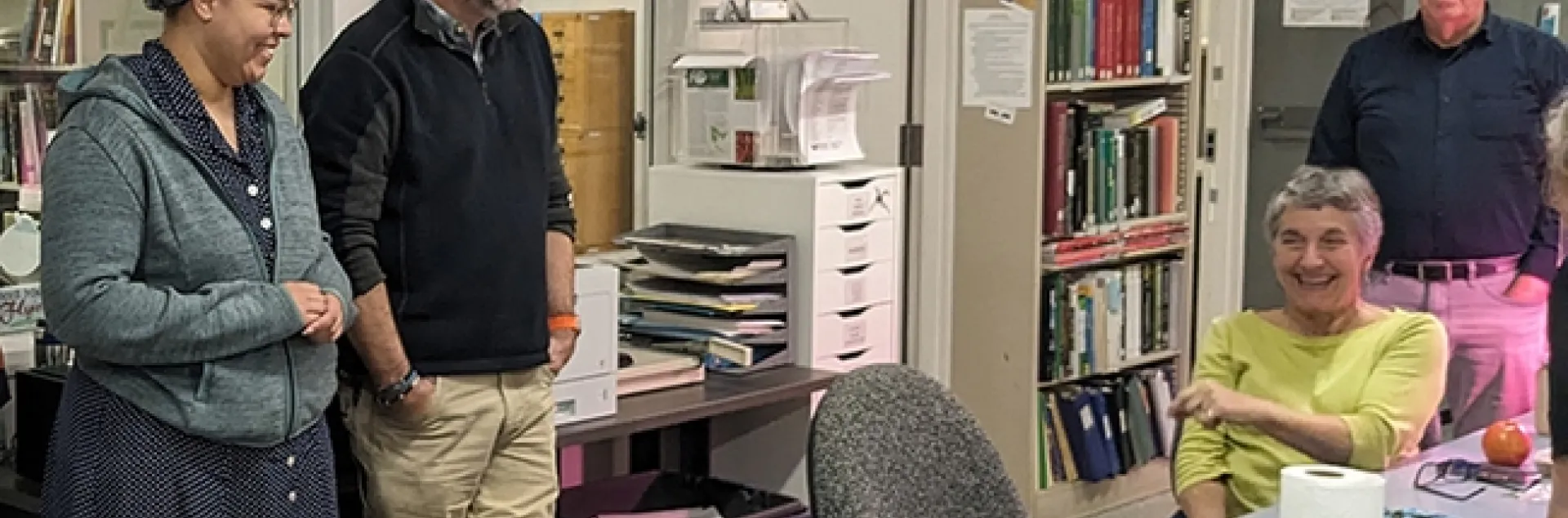 Professor (and now retiree) Lynn Kimsey (seated), former director of the Bohart Museum of Entomology, is honored at a birthday celebration on Feb. 1. With her from left are doctoral student Iris Quayle of the Bond lab; Professor Jason Bond, newly selected director of the Bohart Museum; and entomology researcher Tom Zavortink of the Bohart. (Photo by Tabatha Yang)