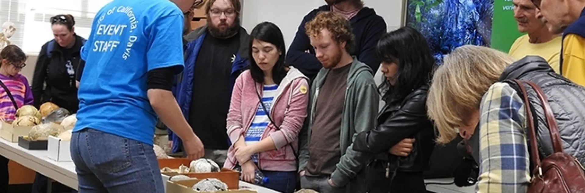 Anthropology Museum: Attendees check out the displays and ask questions. (Photo by Kathy Keatley Garvey)