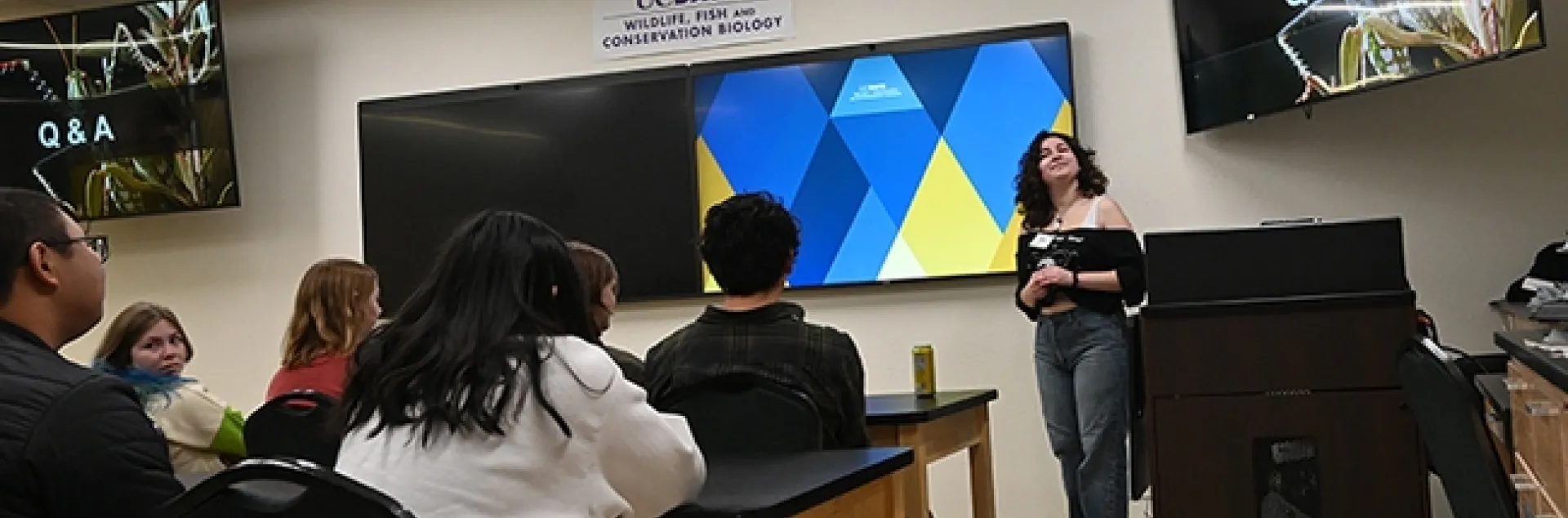 UC Davis student entomologist Sol Wantz begins her presentation on "Grasshoppers, Crickets and Katydids" at the Bohart Museum of Entomology open house. (Photo by Kathy Keatley Garvey)