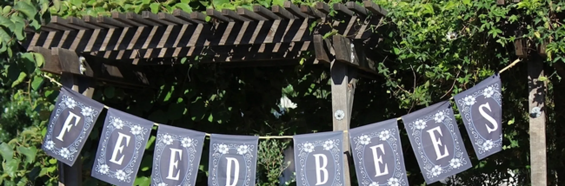 Feed Bees banner at the UC Davis Bee Haven