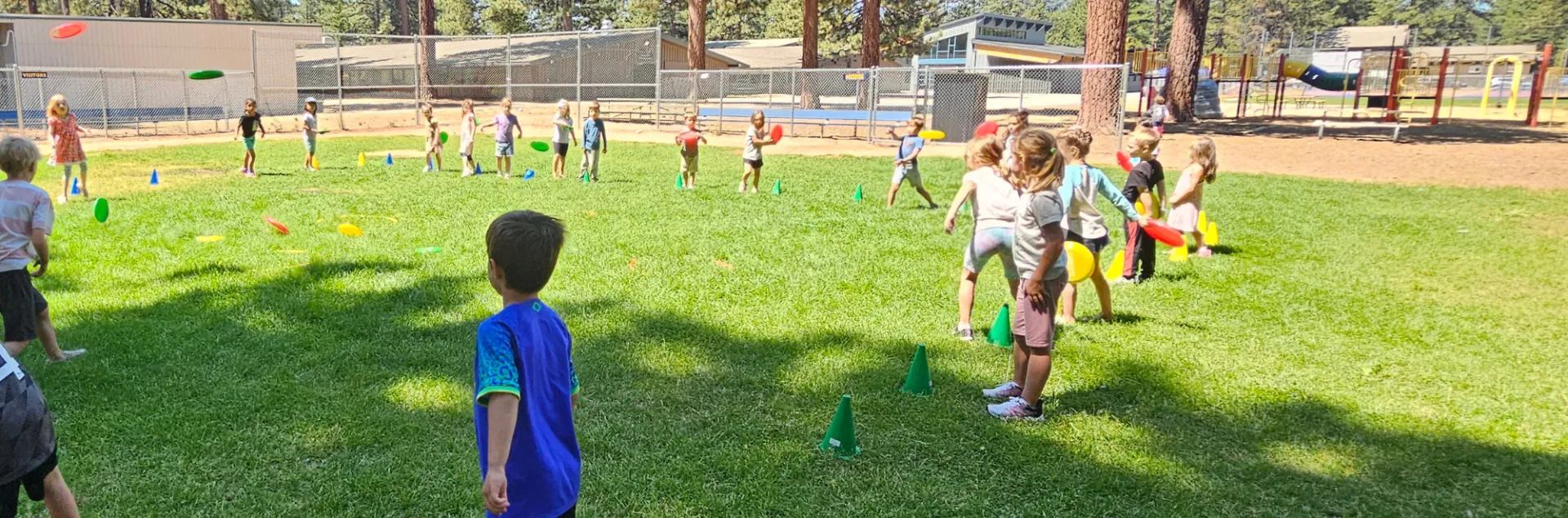 Children playing a frisbee game.