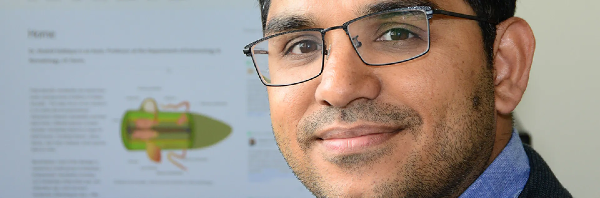 Shahid Siddique, nematologist, smiles at the camera.