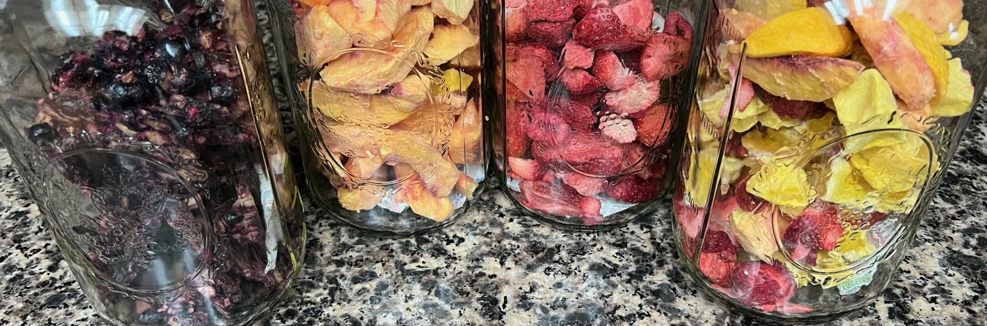 mason jars containing various dehydrated foods