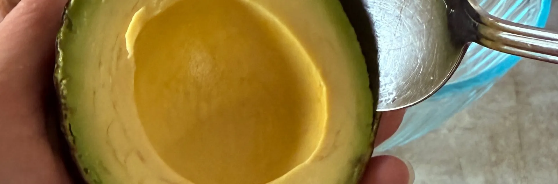 Avocado being scooped out
