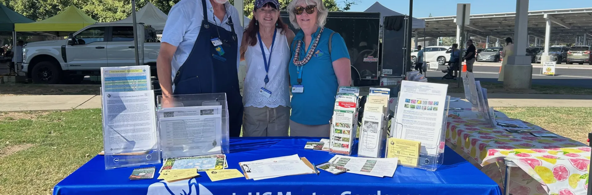 Master Gardeners at the Visalia Farmers Market in their Kiosk