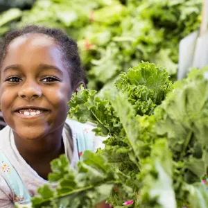 Child with lettuce