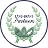 Logo of the Land Grant Summit in a circle formation with green and white lettering around an olive branch